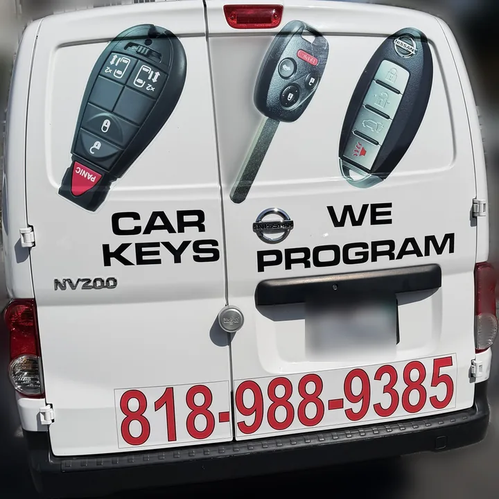 Van Nuys Locksmith van from the back with the shop phone number